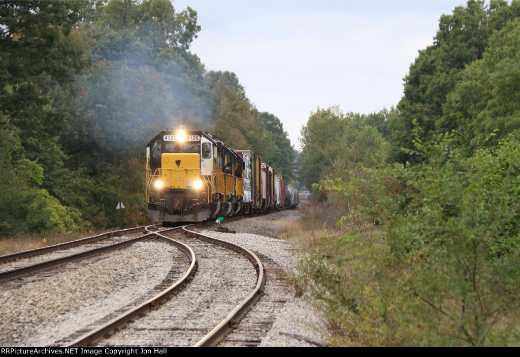 Working hard as the train comes out of a speed restriction, 4125 leads the 303 south